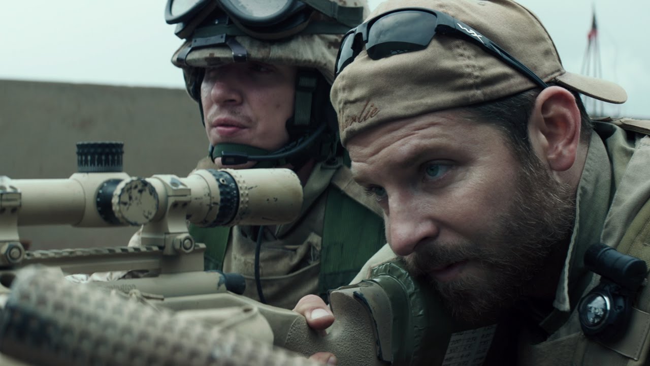 Chris Kyle stares down a sniper scope in 2014's American Sniper film