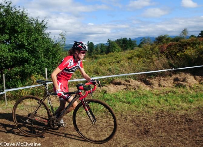 Maghalie Rochette (Cyclocrossworld.com) running in second position on lap three