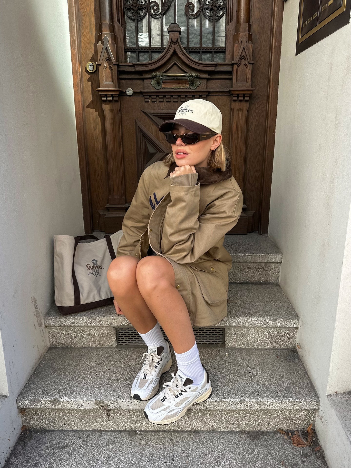 Fashion person Linda Sza wears best brown trainers