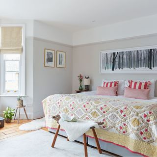 grey bedroom with patterned bedspread