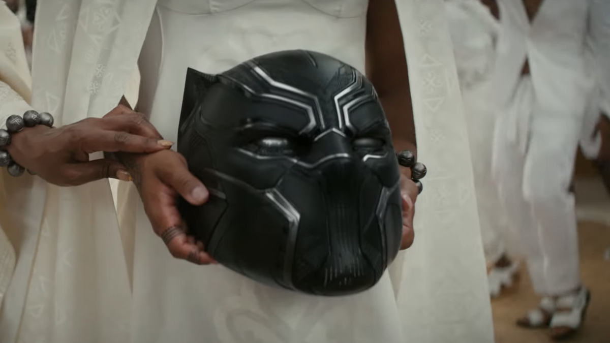 Shuri holding T&#039;Challa&#039;s helmet in Black Panther 2