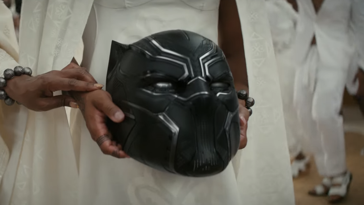 Shuri holds T'Challa's helmet in Black Panther 2