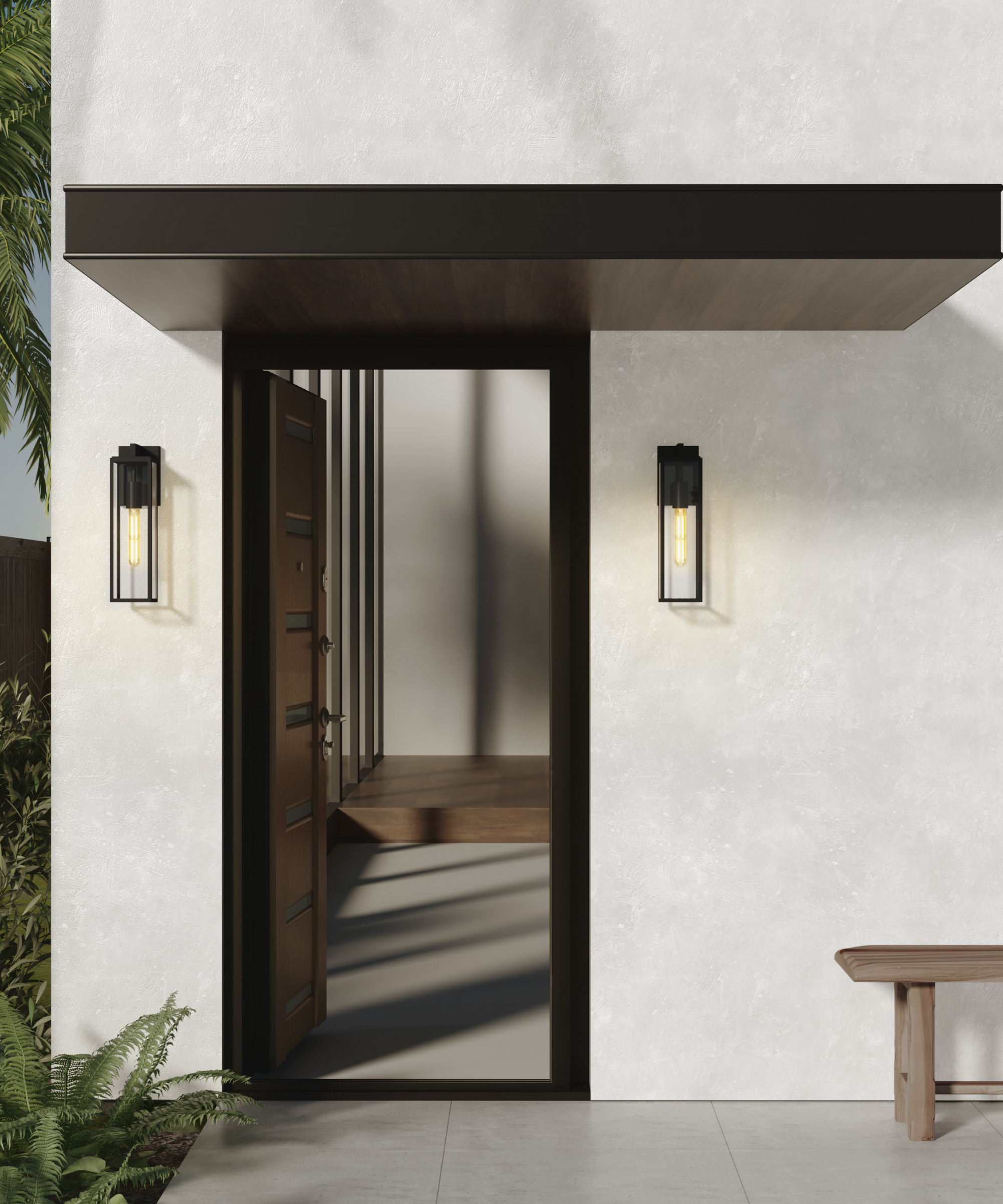 light coloured rendered entrance with black metal porch canopy, open front door and two black and glass slim lights either side of the door