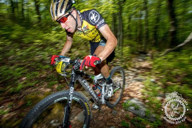 Jeremiah Bishop in the green singletrack of the e nduro segment of Stage 2