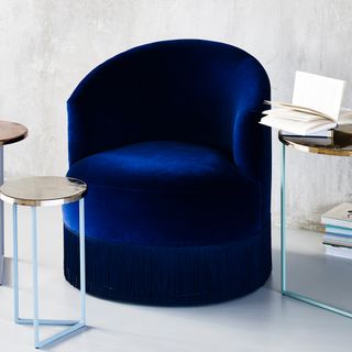 navy colour chair with book metal stool