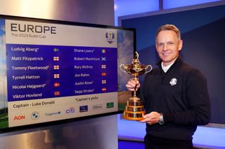 Luke Donald holds the Ryder Cup trophy