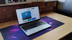 Tecno Megabook T1- laptop open on a desk.