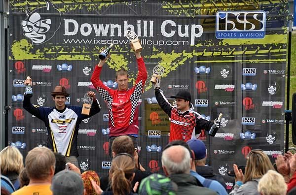 The elite men's podium at the iXS Downhill Cup in Leogang