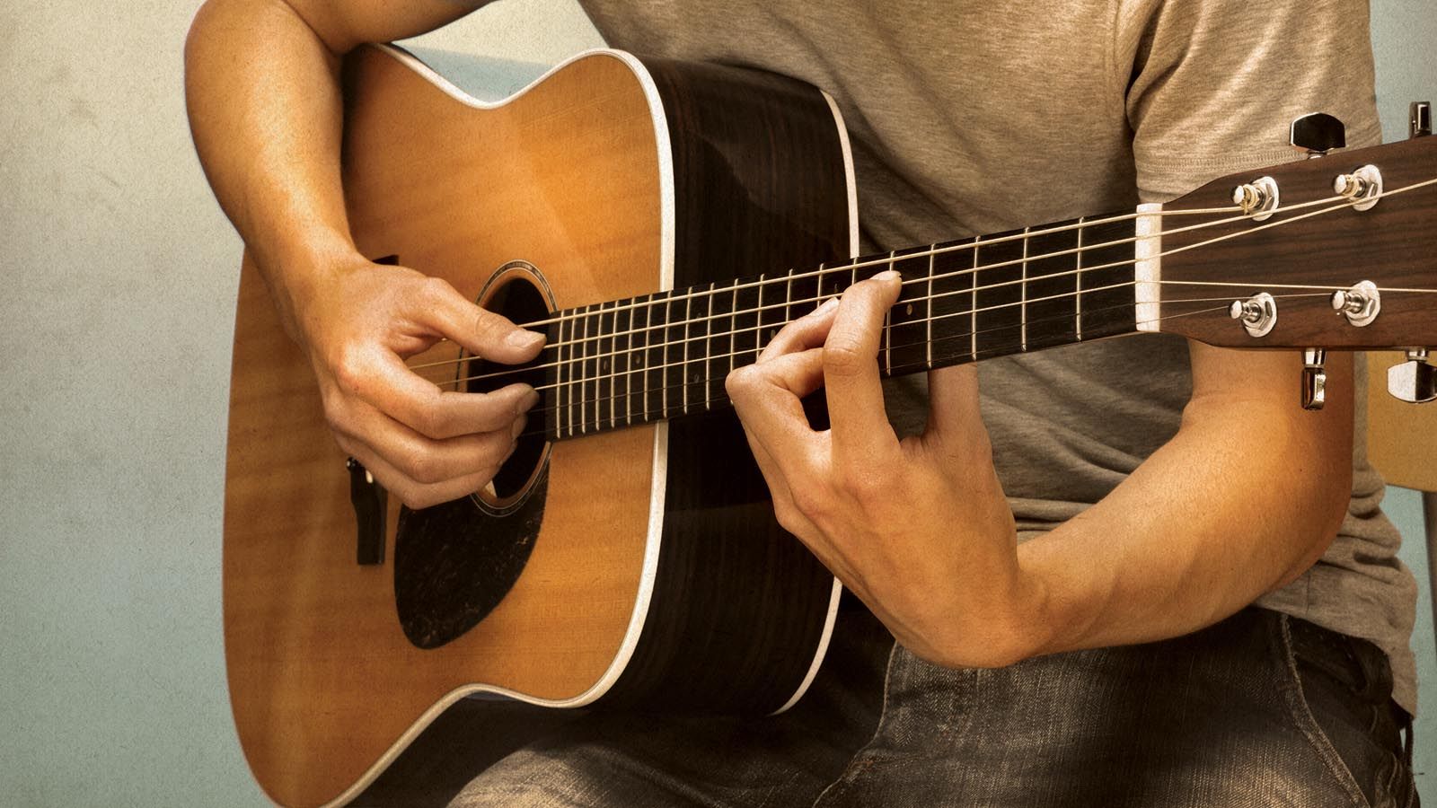 Гитара обучение видео. Игра на гитаре. Хобби гитара. Уроки гитары. Человек играющий на гитаре.