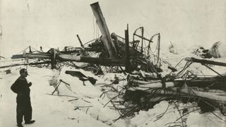 Explorer Frank Wild (1873 - 1939) looking at the wreckage of the 'Endurance' during the Imperial Trans-Antarctic Expedition, 1914-17