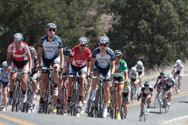 The women's peloton rolling in behind the break.