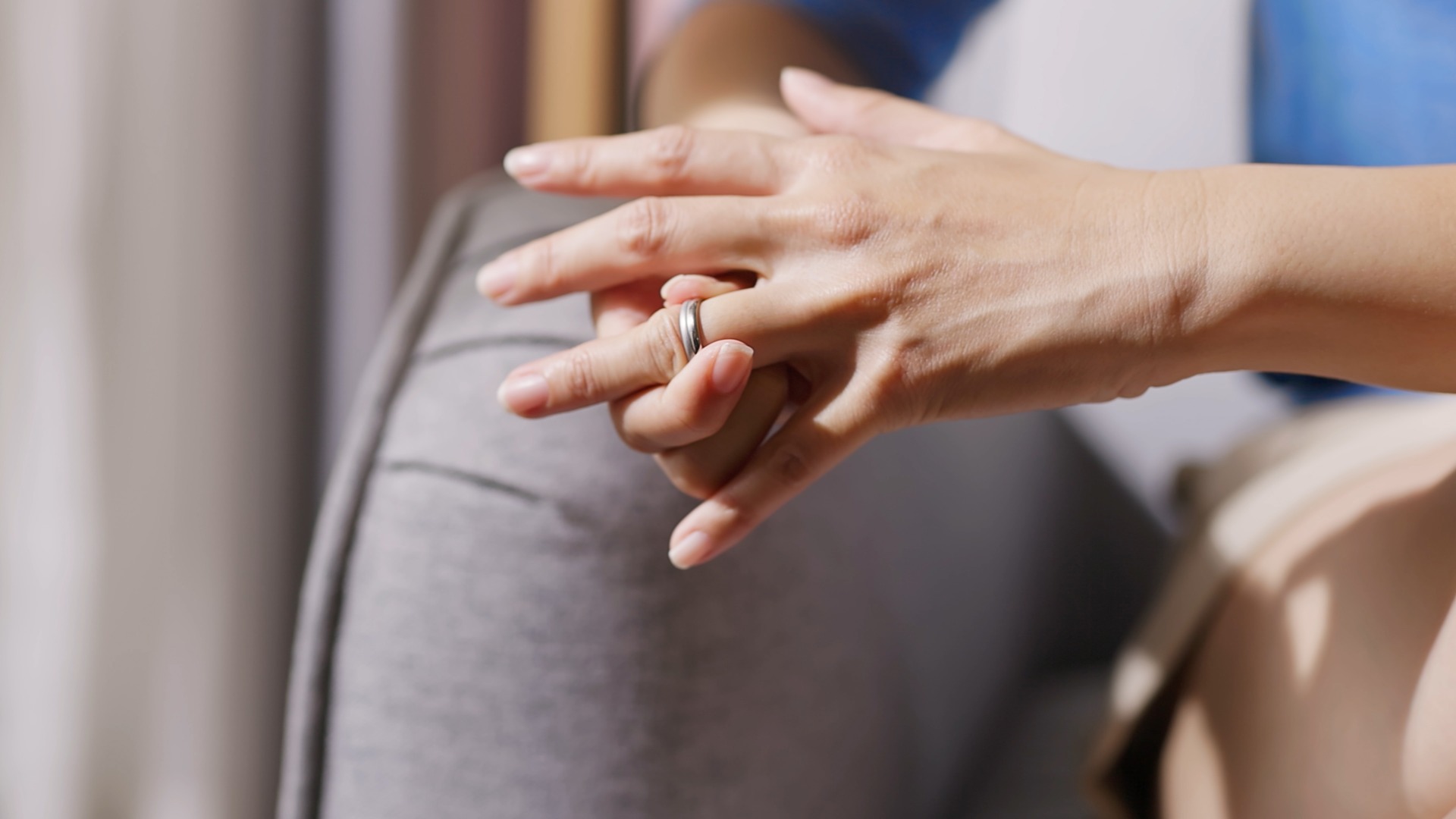 Woman removing her wedding ring
