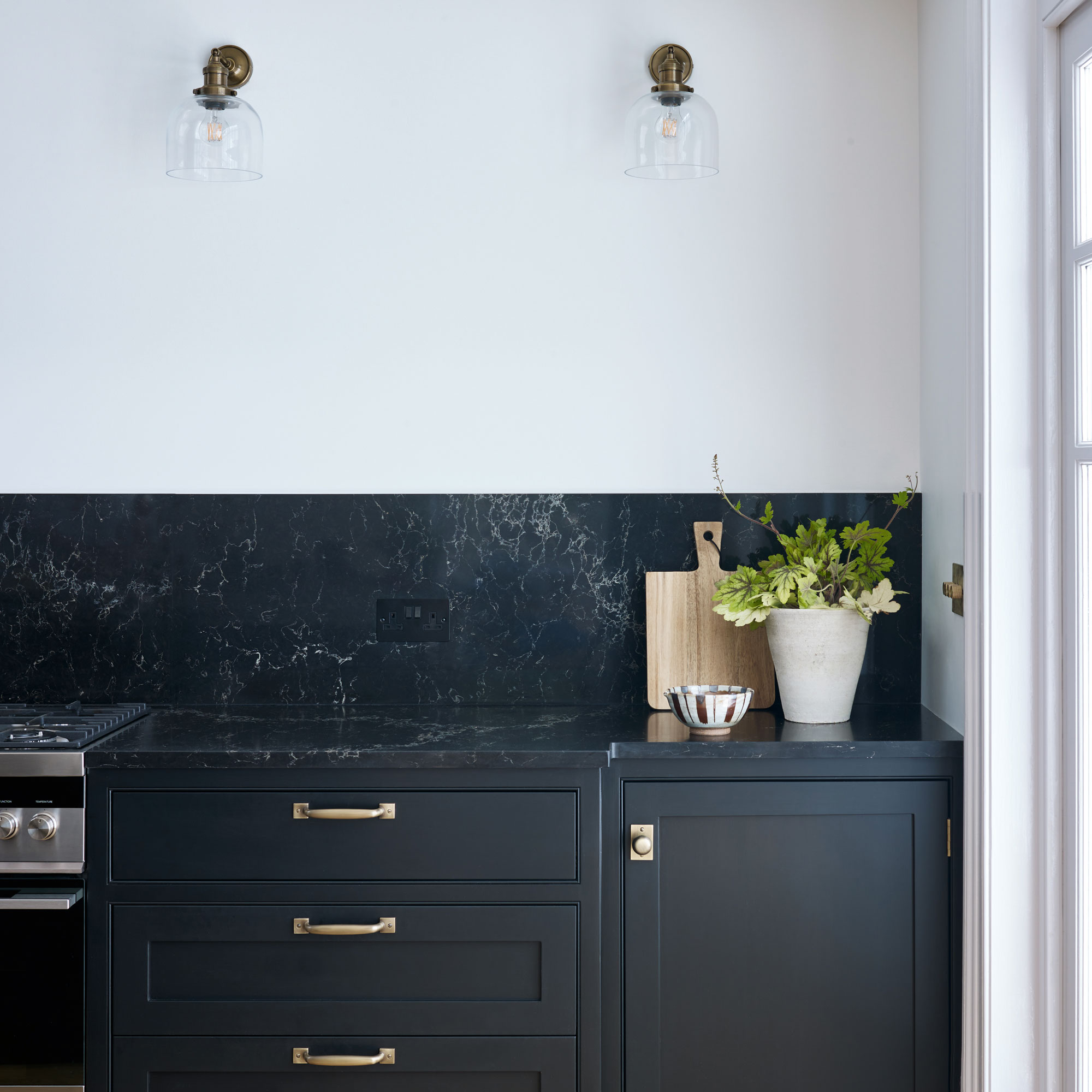 Black kitchen cabinets with black kitchen worktop