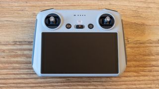 DJI RC Smart Controller on the ground to show the controls