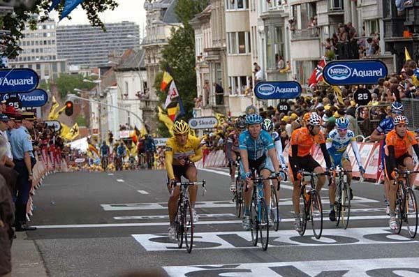 The yellow jersey and other riders caught in the crash in the last couple of kilometres are crossing the line, not looking happy.