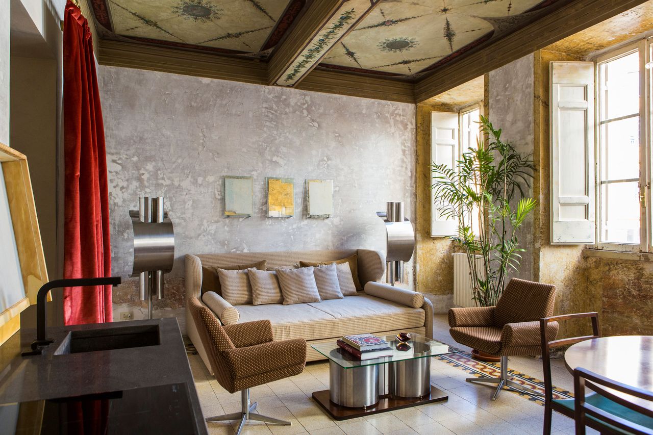A rough-wall palazzo is revamped with modernist Italian furniture.