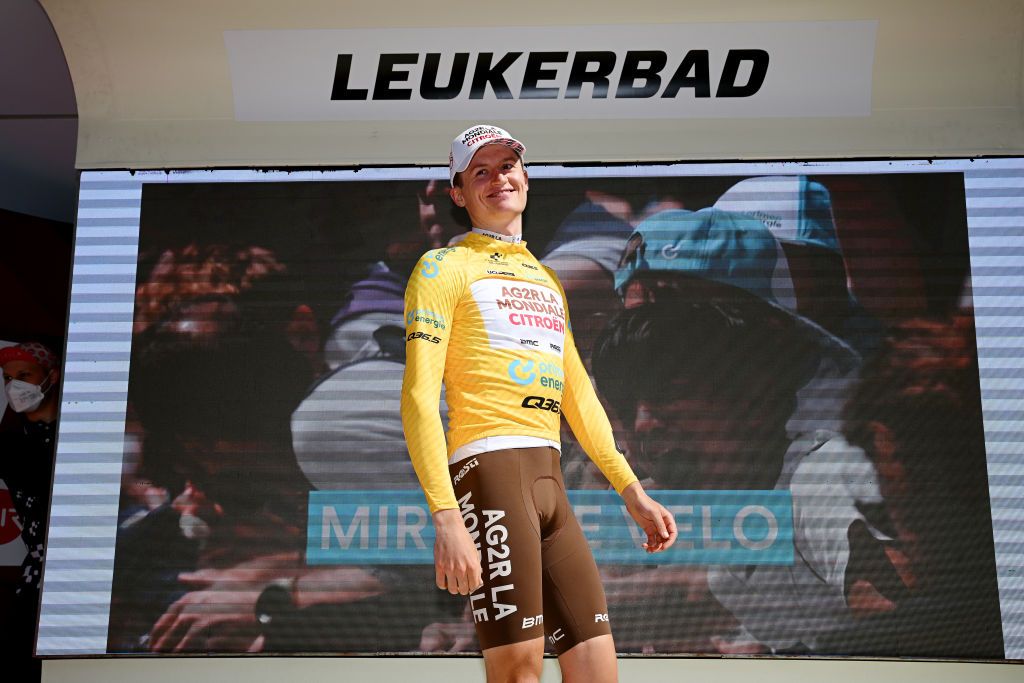 LEUKERBAD SWITZERLAND JUNE 14 Felix Gall of Austria and Ag2R Citron Team celebrates at podium as Yellow leader jersey winner during the 86th Tour de Suisse 2023 Stage 4 a 1525km stage from Monthey to Leukerbad 1367m UCIWT on June 14 2023 in Leukerbad Switzerland Photo by Dario BelingheriGetty Images