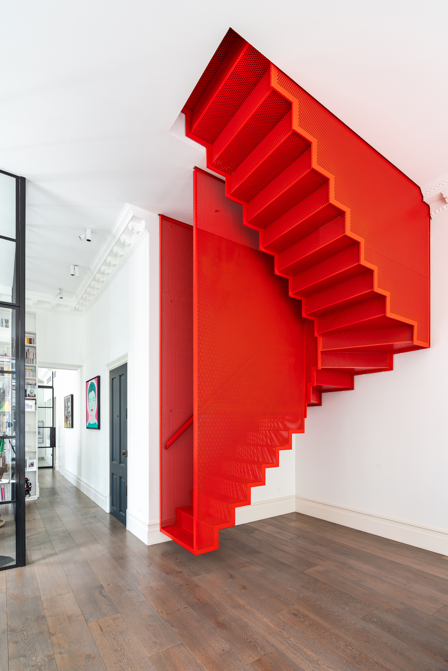 red floating staircase by michaelis boyd