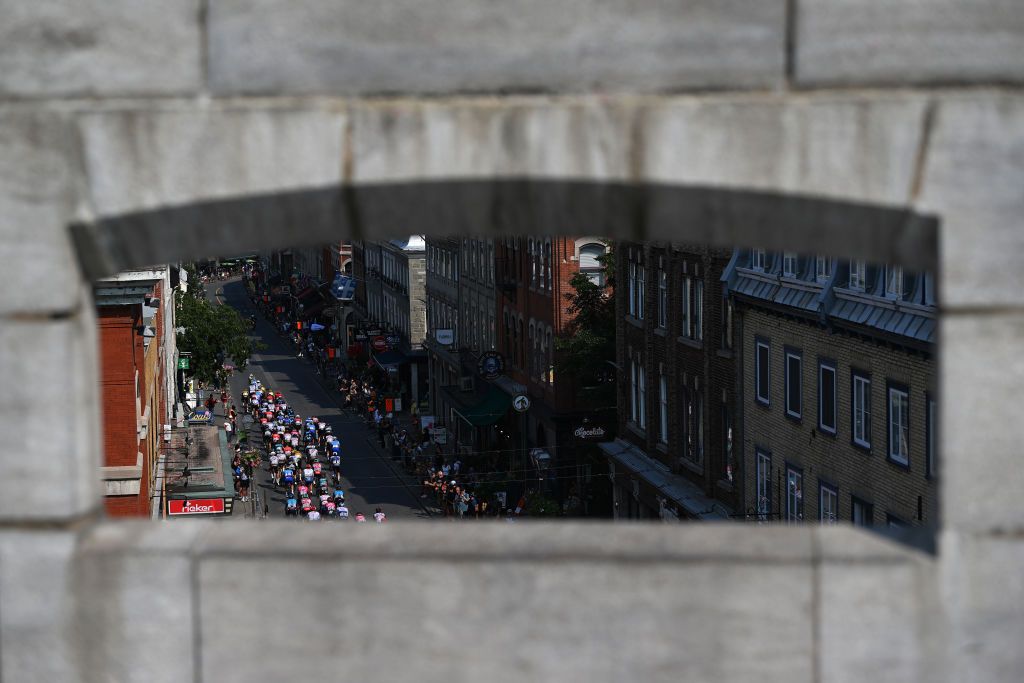 QUEBEC CITY QUEBEC SEPTEMBER 09 A general view of the peloton passing through Qubec City during the 11th Grand Prix Cycliste de Qubec 2022 a 2016km one day race from Quebec to Quebec GPCQM on September 09 2022 in Quebec City Quebec Photo by Dario BelingheriGetty Images