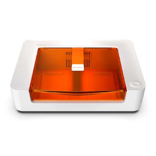 Best laser cutters and engravers; a white and orange, small laser machine
