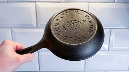 The Field Company Skillet in hand
