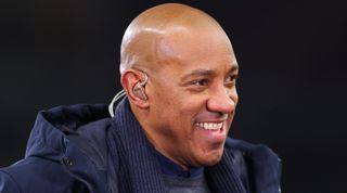 Pundit Dion Dublin smiles prior to the Premier League match between Aston Villa and Leeds United at Villa Park on January 13, 2023 in Birmingham, United Kingdom.