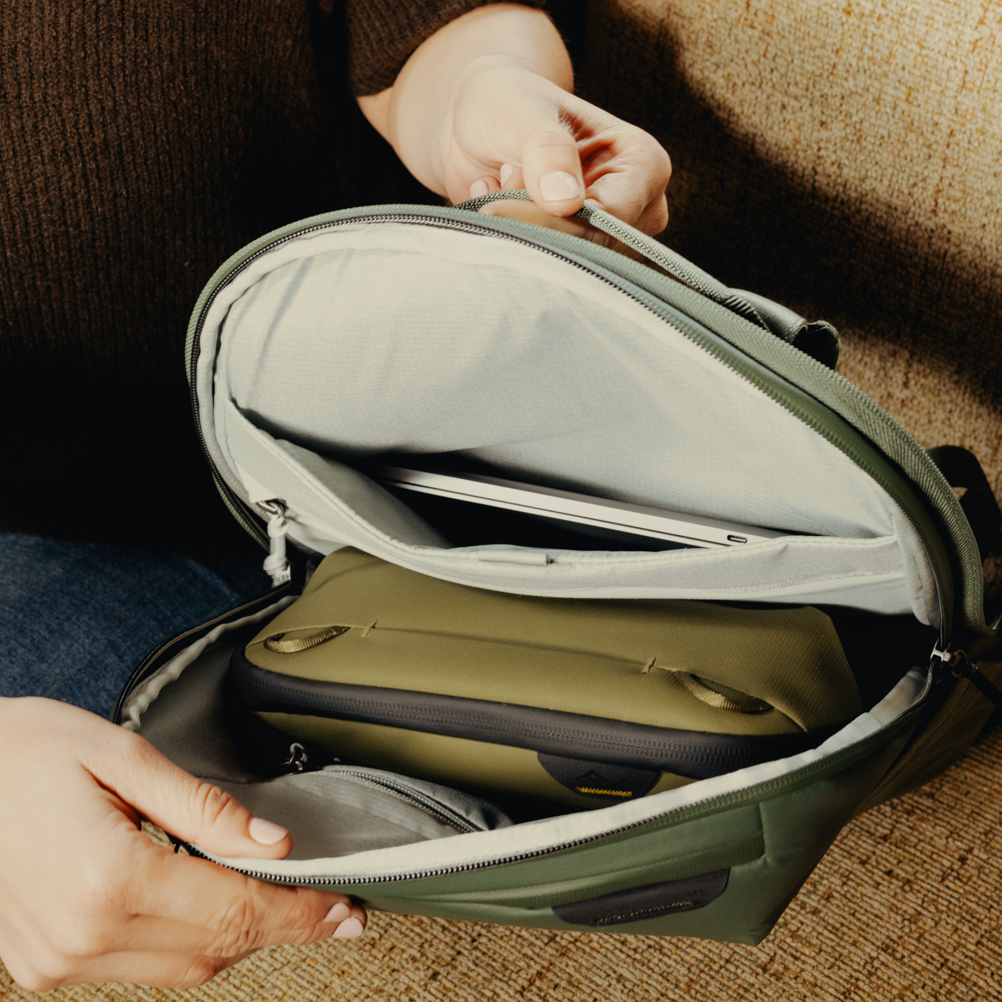 Photograph of Peak Design Travel Backpack 2-in-1 open to reveal smaller daypack inside main backpack