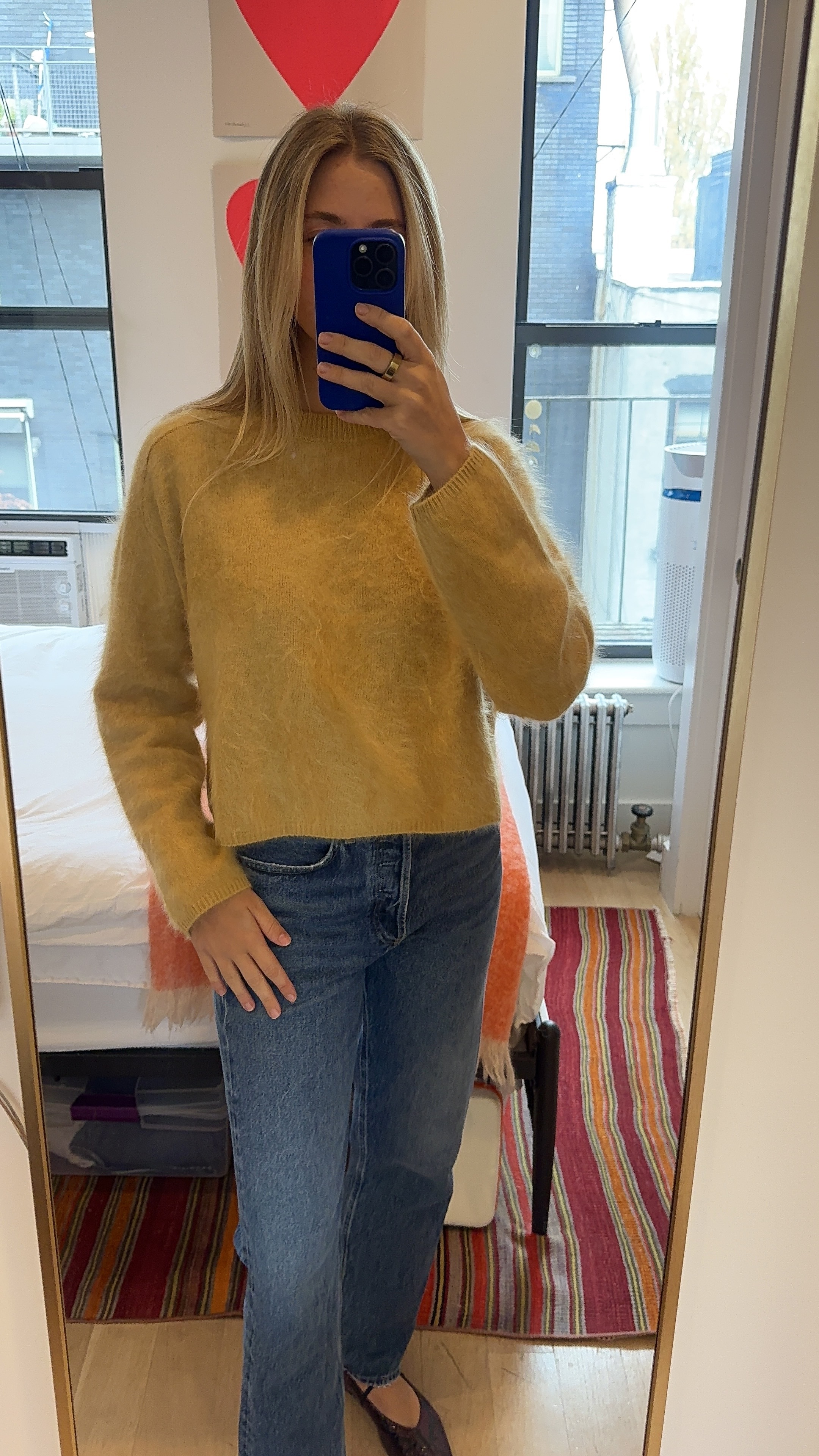 Bailey Burke in a cashmere sweater.