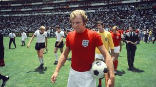 Bobby Moore, captain of England, leads his team out ahead of the 1970 FIFA World Cup quarter-final match against West Germany.