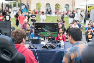 college students playing competitive games outside