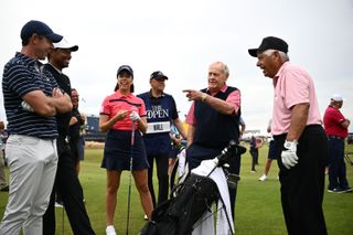 Hall, Tiger Woods, Rory McIlroy, Lee Trevino and Jack Nicklaus chat on the 18th tee