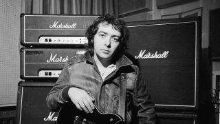 Guitarist Bernie Marsden from the band Whitesnake posed with guitar and Marshall amplifiers in Acton, London in October 1983.