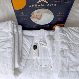 The Dreamland heated duvet being tested on a bed