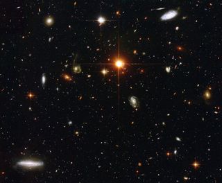 Gazing deep into the universe, NASA's Hubble Space Telescope has spied a menagerie of galaxies. This image represents a typical view of our distant universe. In taking this picture, Hubble is looking down a long corridor of galaxies stretching billions of