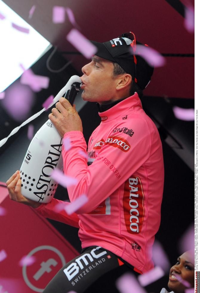 Cadel Evans (BMC) enjoys a sip of champagne