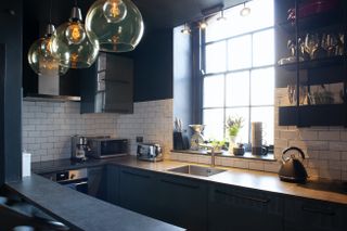 The kitchen, which Pete designed on a budget, with the help of the Ikea kitchen department, colour advice from Farrow and Ball (the walls are painted in Railings) and his partner, Reena Maroo, who has a keen eye for design.