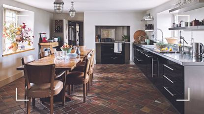 Rustic kitchen with contemporary black cabinets pale gray walls and rustic parquet flooring to show classic paint color ideas for a kitchen