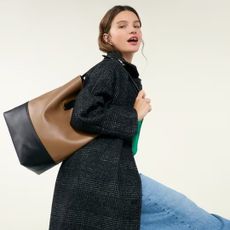 Old navy models carrying fall 2025 handbags on gradient background 