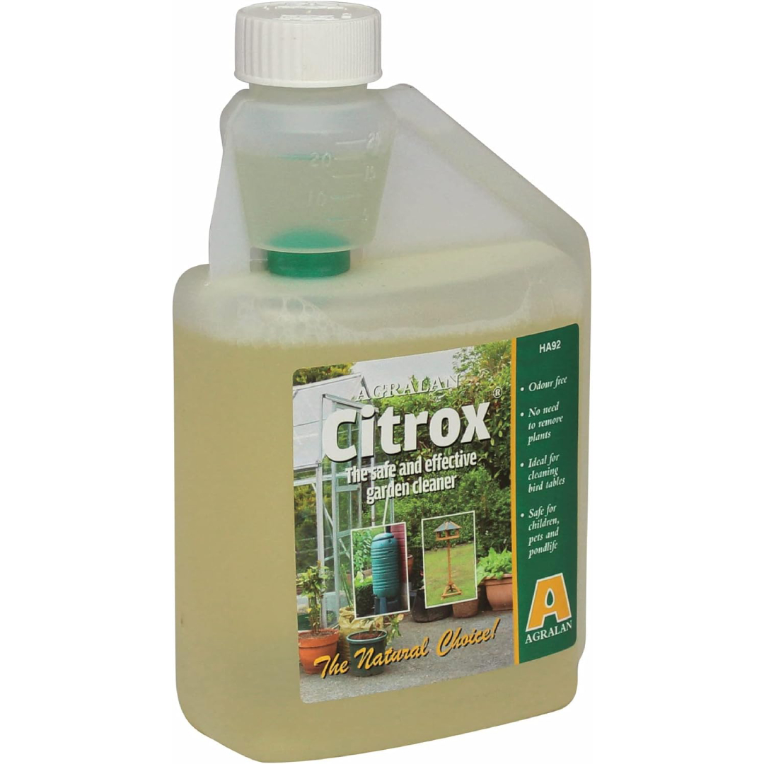 plastic container filled with Citrox cleaning solution