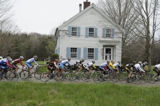 The peloton passing a secluded country home on Mountain Road