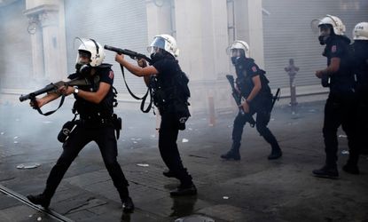 Riot police use tear gas during an anti-government protests at Taksim Square in central Istanbul, May 31.