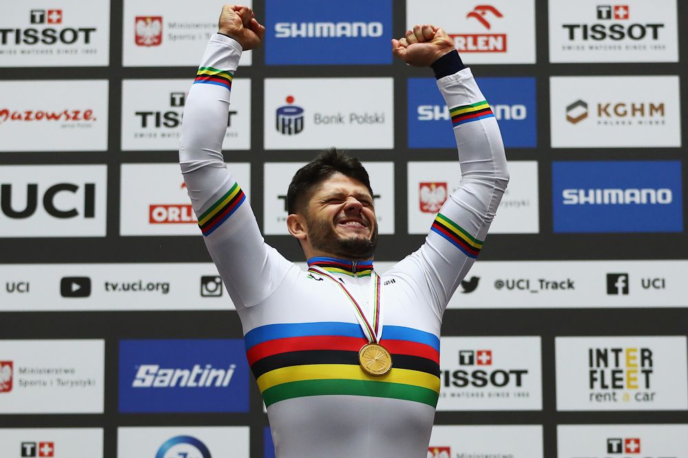 Quentin Lafargue of France celebrates on the podium after winning the gold medal in the Mens 1 km time trial