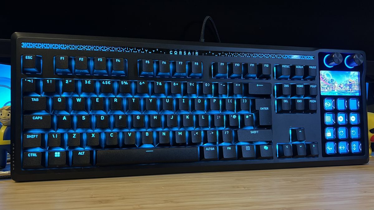 Corsair Galleon 100 SD gaming keyboard on a wooden desk
