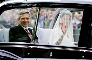 Kate Middleton and father Michael Middleton being driven down the Mall on her wedding day