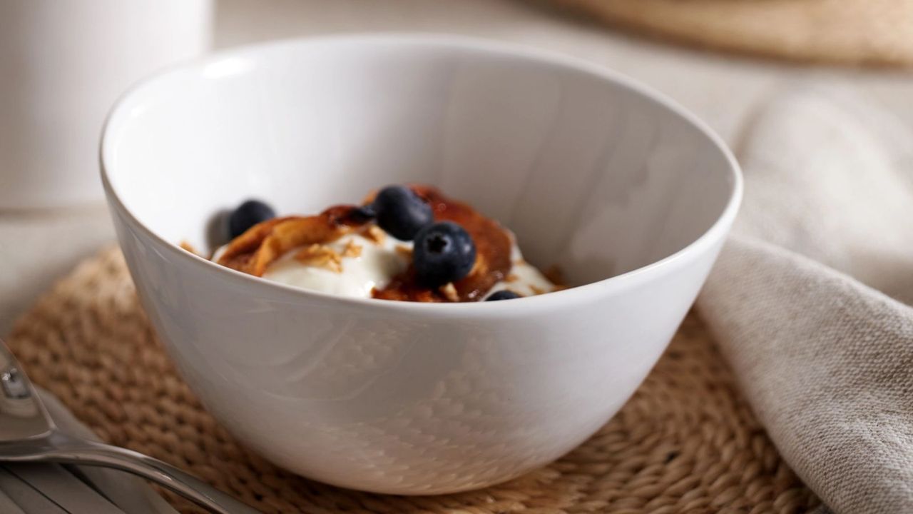 One of the best bowls, The White Company&#039;s Hampton bowl with fruit and granola on a wicker tablemat