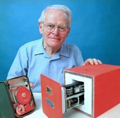 David Warren with a later version of his famous black box flight recorder.
