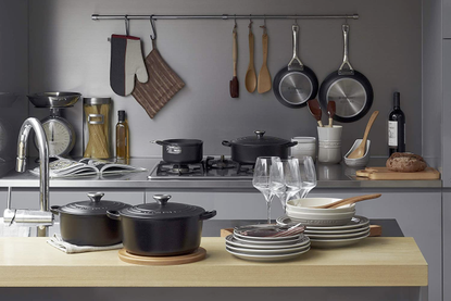 A kitchen with Le Creuset dishes