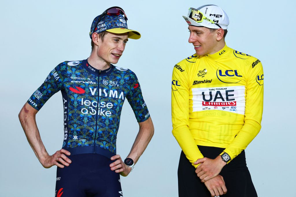 Danish Jonas Vingegaard of Team Visma-Lease a Bike and Slovenian Tadej Pogacar of UAE Team Emirates pictured on the podium after stage 21, the final stage of the 2024 Tour de France cycling race, an individual time trial from Monaco to Nice, France (33,7 km) on Sunday 21 July 2024. The 111th edition of the Tour de France starts on Saturday 29 June and will finish in Nice, France on 21 July. BELGA PHOTO DAVID PINTENS (Photo by DAVID PINTENS / BELGA MAG / Belga via AFP)