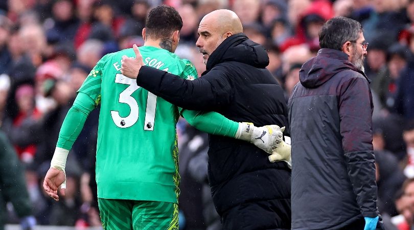 Ederson is consoled by manager Pep Guardiola as he is substituted in Manchester City&#039;s 1-1 draw with Liverpool in March 2024.