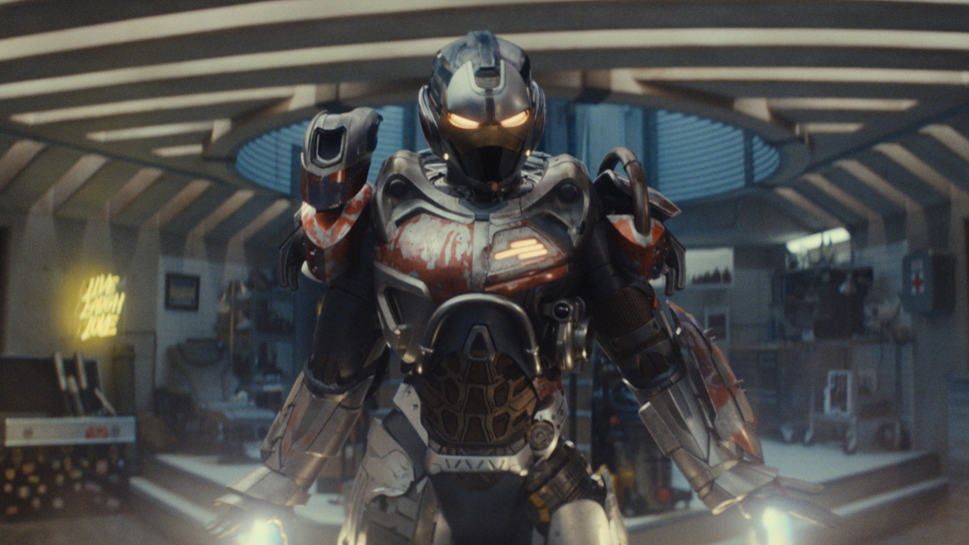 Riri Williams levitating in her armored suit in Joe&#039;s underground bunker in Ironheart